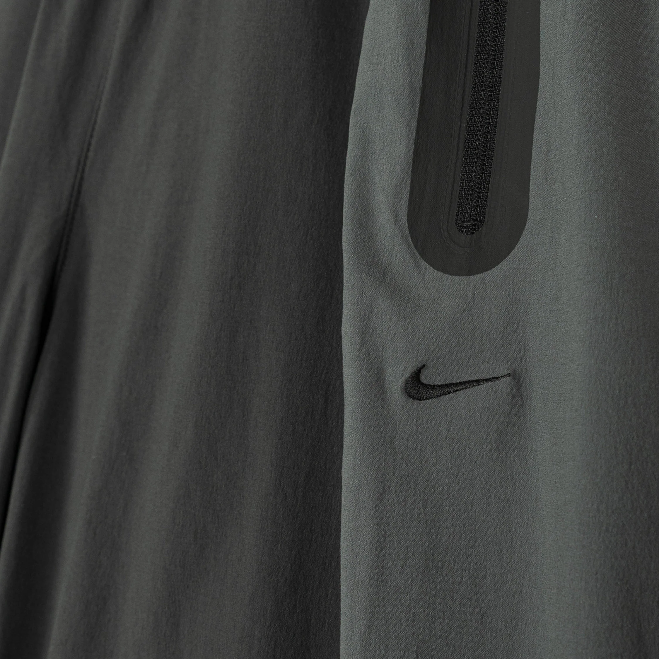 Nike	Tech Dri-Fit Woven Color-Block Trousers - Image 6